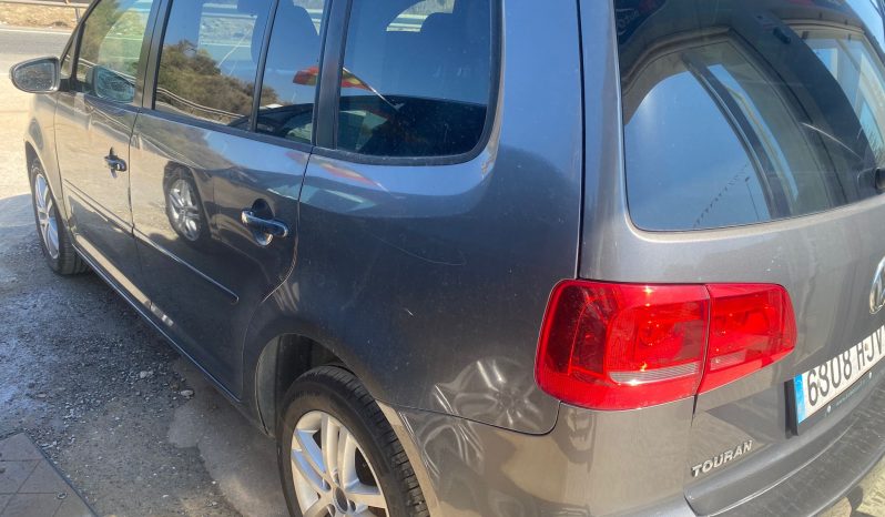 VW. TOURAN 1.6 TDI 105 CV 2012 lleno